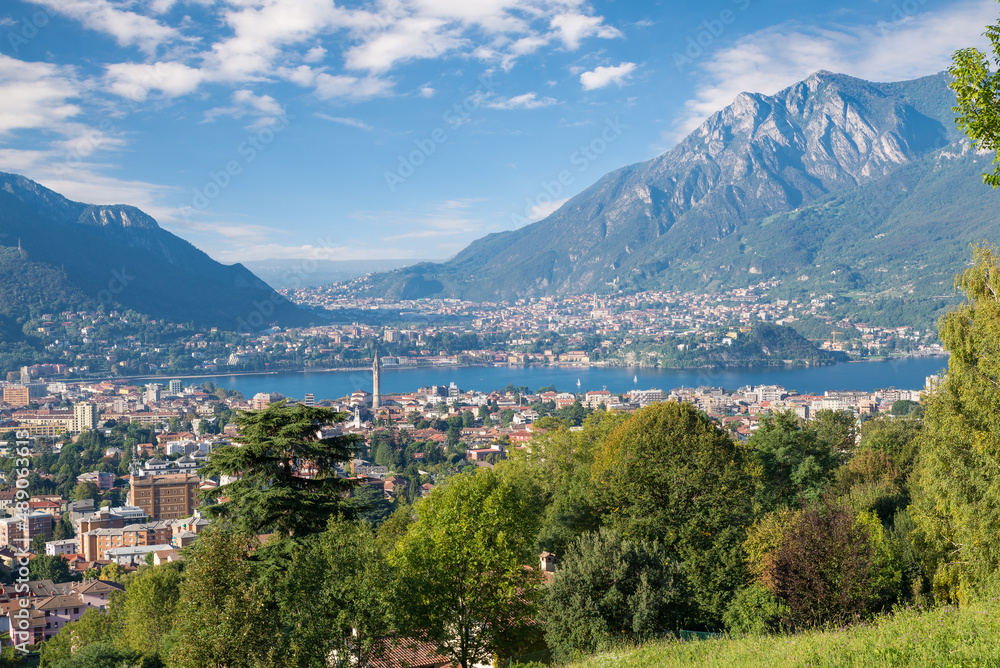 Lake Como and the city of Lecco, italy. Panoramic view from above with Lecco city in the foreground and the towns of Malgrate, Valmadrera and Civate in the background 