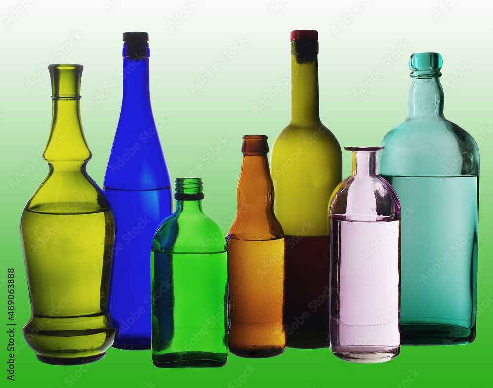 Bottles with wines and spirits on a colored background. Bottles with wines and spirits on a colored background.