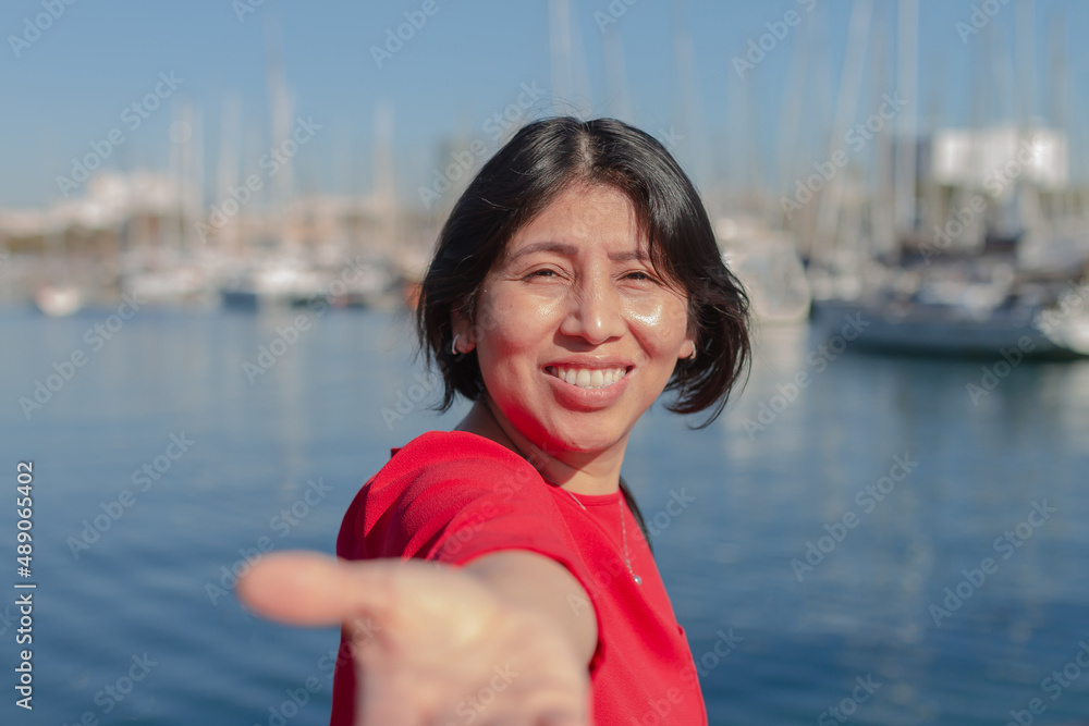 Happy latin girl on vacation in Barcelona (Spain). Happy latin girl on vacation in Barcelona (Spain).