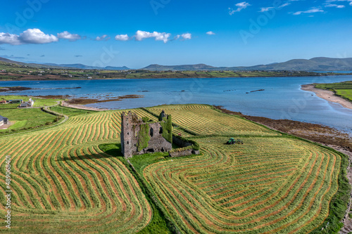 Aerial view at Cahersiveen Ballycarbery Castle in County Kerry Ireland Wild Atlantic Way seen by drone