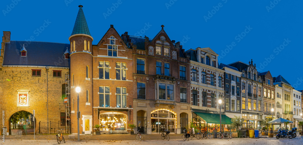 Panoramic photo during the blue hour of the GevangenPoort and the old building aan de Plaats en Buitenhof in The Hague