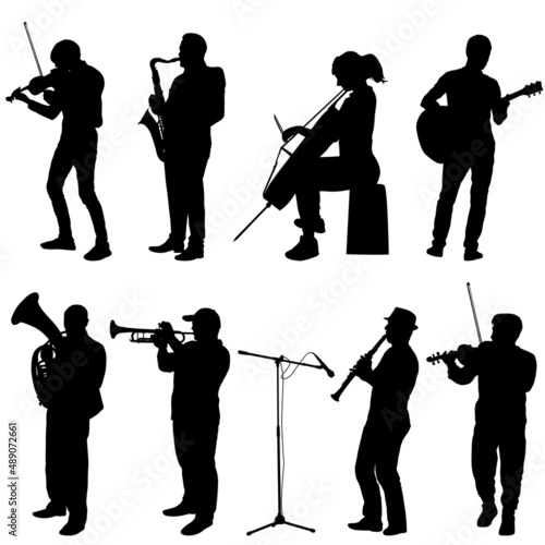 Silhouettes street musicians playing instruments on a white background