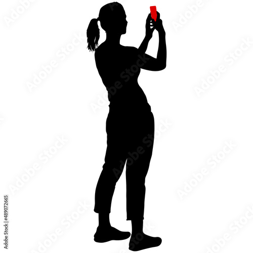 Silhouettes woman taking selfie with smartphone on white background