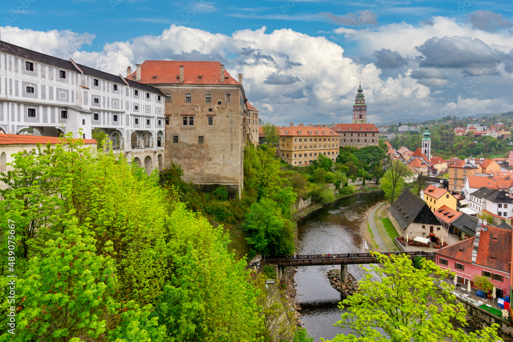 Cesky Krumlov cityscape with castle over old town and Vltava river, Czech Republic