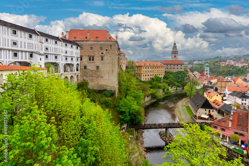 Cesky Krumlov cityscape with castle over old town and Vltava river, Czech Republic