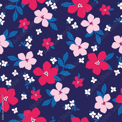 Seamless vintage pattern. Pink and white flowers, bright blue leaves. Dark blue background. vector texture. fashionable print for textiles, wallpaper and packaging.