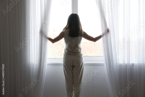 Silhouette of pretty young ...