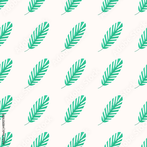 Green palm branch on a light background for web design
