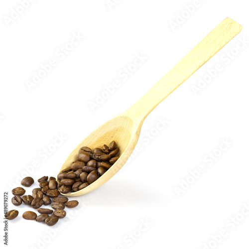 image of coffee beans on a spoon close-up
