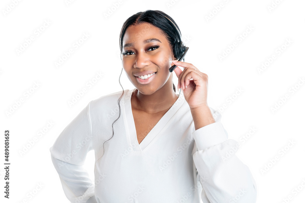 Studio portrait of a beautiful business woman dark-skinned holding with headset Studio portrait of a beautiful business woman dark-skinned holding with headset