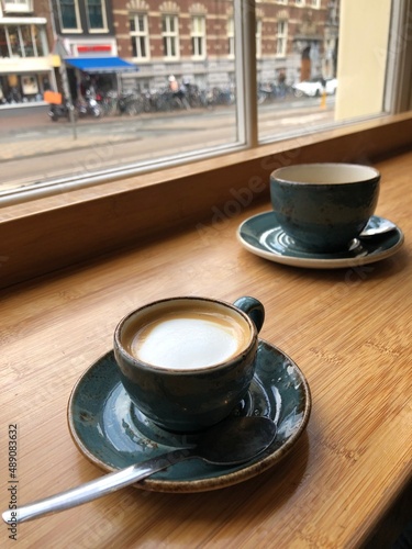 Photography cozy blue coffee cups inside a cafe
