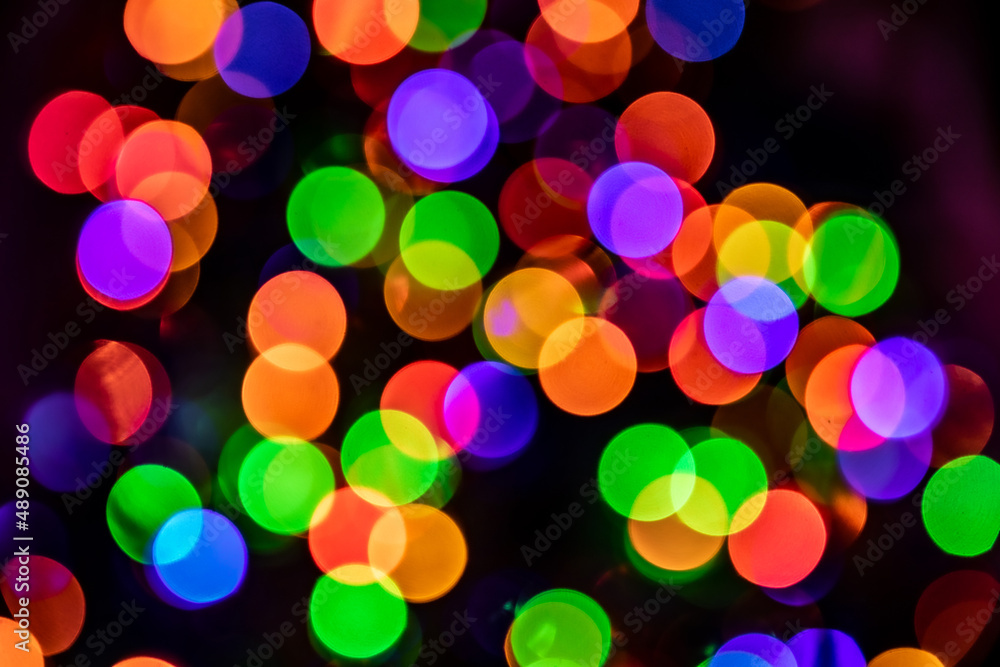 Bright and colorful Christmas lights out of focus creating beautiful orbs abstract background Bright and colorful Christmas lights out of focus creating beautiful orbs abstract background