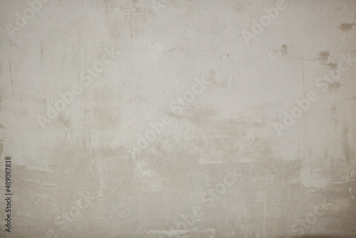 Old concrete wall texture. Construction drawing surface. Abstract vintage cracked stones rough, creamy natural color, grunge loft, antique design