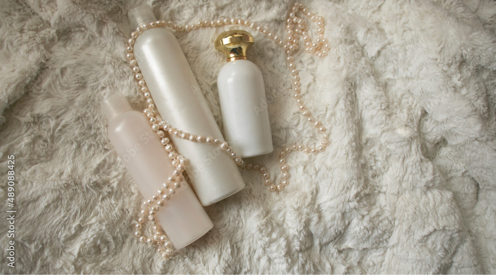 pearls and perfumes lie on the fur
pearls and perfumes lie on the fur