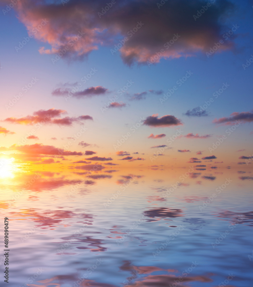 Dawn in the early morning on a summer day over the ocean. Dawn in the early morning on a summer day over the ocean.