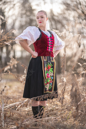 Tela Young beautiful slovak woman in traditional dress