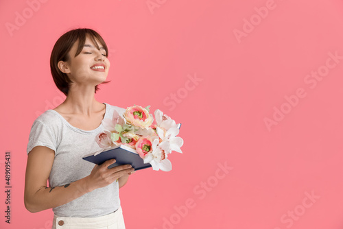 Beautiful young woman with ...