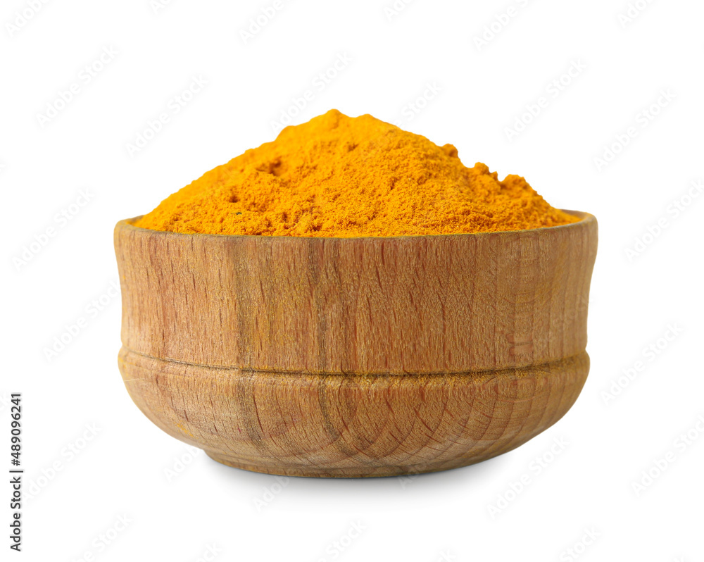 Wooden bowl of turmeric powder on white background Wooden bowl of turmeric powder on white background