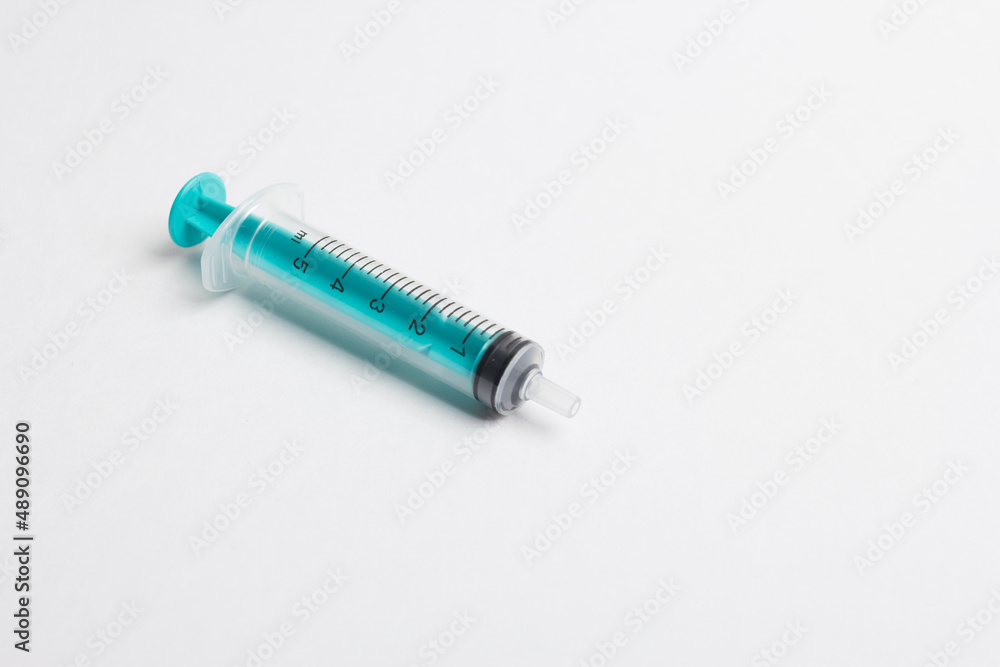 medical syringe with a vaccine isolated on a white background. the concept of vaccination of the population against the virus and diseases medical syringe with a vaccine isolated on a white background. the concept of vaccination of the population against the virus and diseases