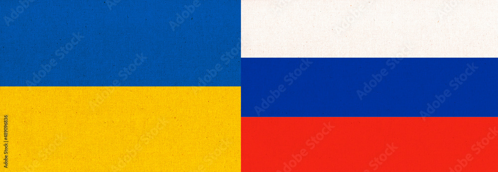 Flag of the two countries. Ukrainian and Russian two folded flags Flag of the two countries. Ukrainian and Russian two folded flags