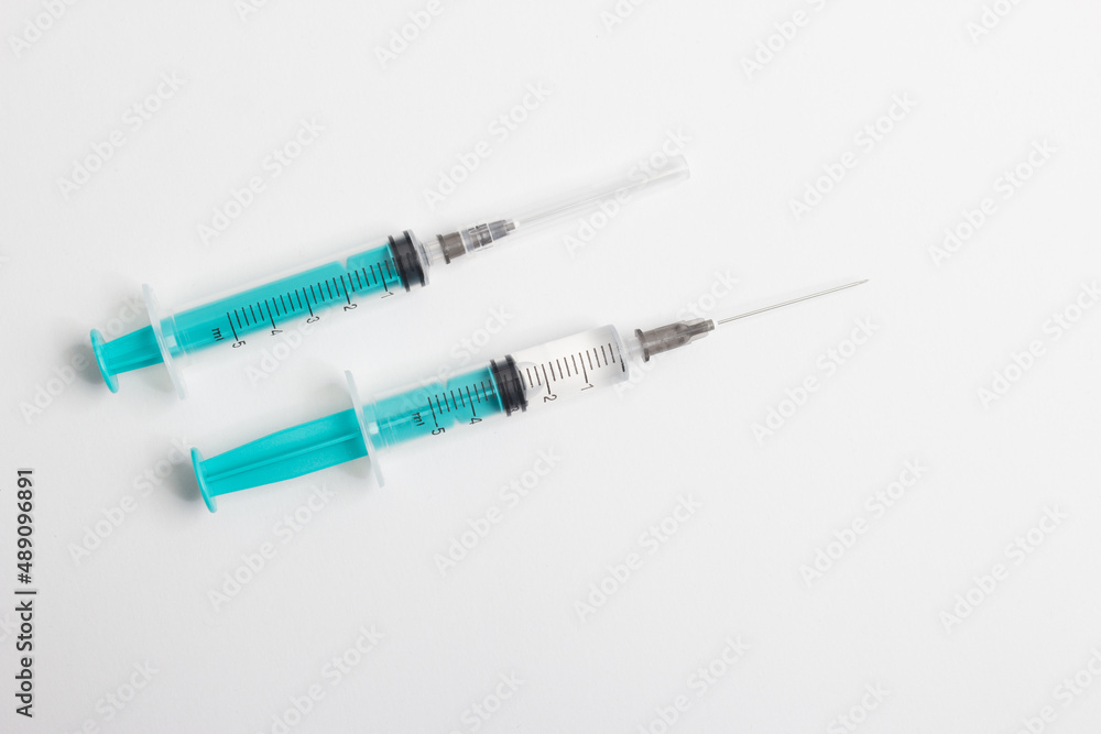 medical syringe with a vaccine isolated on a white background. the concept of vaccination of the population against the virus and diseases medical syringe with a vaccine isolated on a white background. the concept of vaccination of the population against the virus and diseases