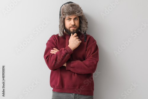 Stylish bearded man in swea...