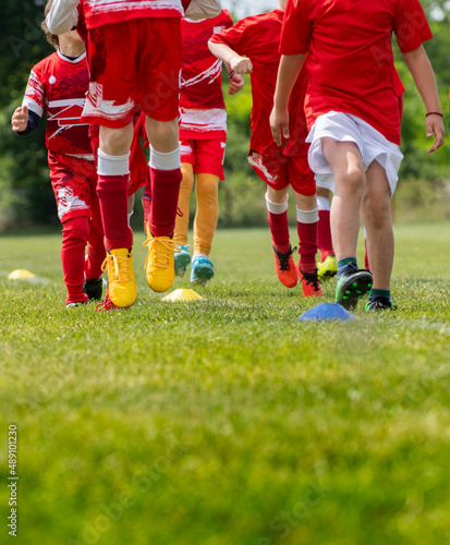 Young soccer players running photo