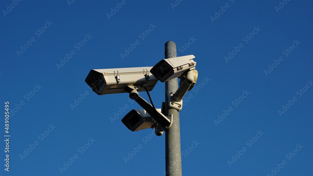 urban video surveillance cameras against sky urban video surveillance cameras against sky