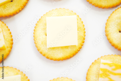 Round Salty Crackers with Sliced Cheese on Top