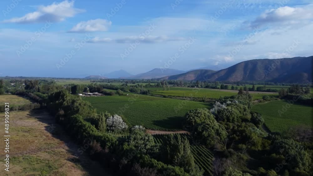 Slow pan to the right over a rural zone at Isla de Maipo, Chile. Aerial footage. Slow pan to the right over a rural zone at Isla de Maipo, Chile. Aerial footage.