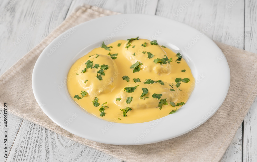 Quenelle with Hollandaise sauce