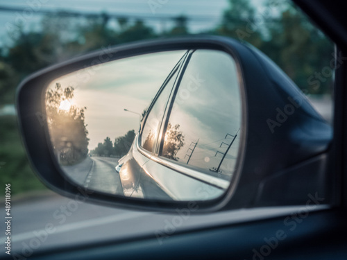 Outdoor car drive mirror glass view automobile speed street road highway traffic landscape mountain sky travel journey trip vacation sunset natural happy holiday summer season beautiful concept © StreetOnCamara