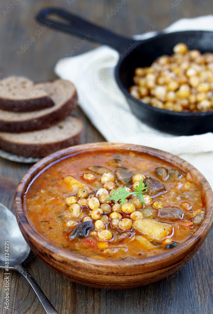 CHICKPEA AND BEEF STEW, soup with chickpeas and meat, hearty chowder, latin cuisine CHICKPEA AND BEEF STEW, soup with chickpeas and meat, hearty chowder, latin cuisine