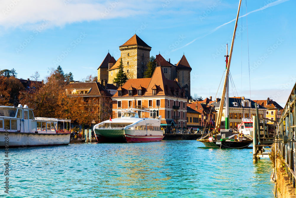 Medieval city of Annecy with Thiou canal at sunny winter day, Haute Savoie department in Auvergne Rhone Alpes region, France
