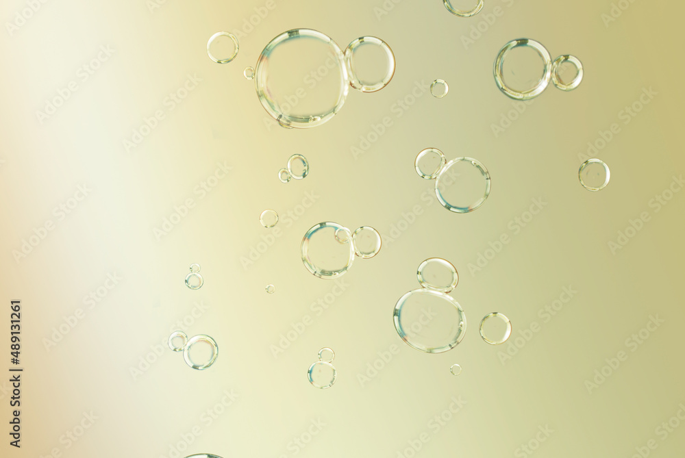 Soap bubbles against a light brown background for text and advertising. Soap bubbles against a light brown background for text and advertising.