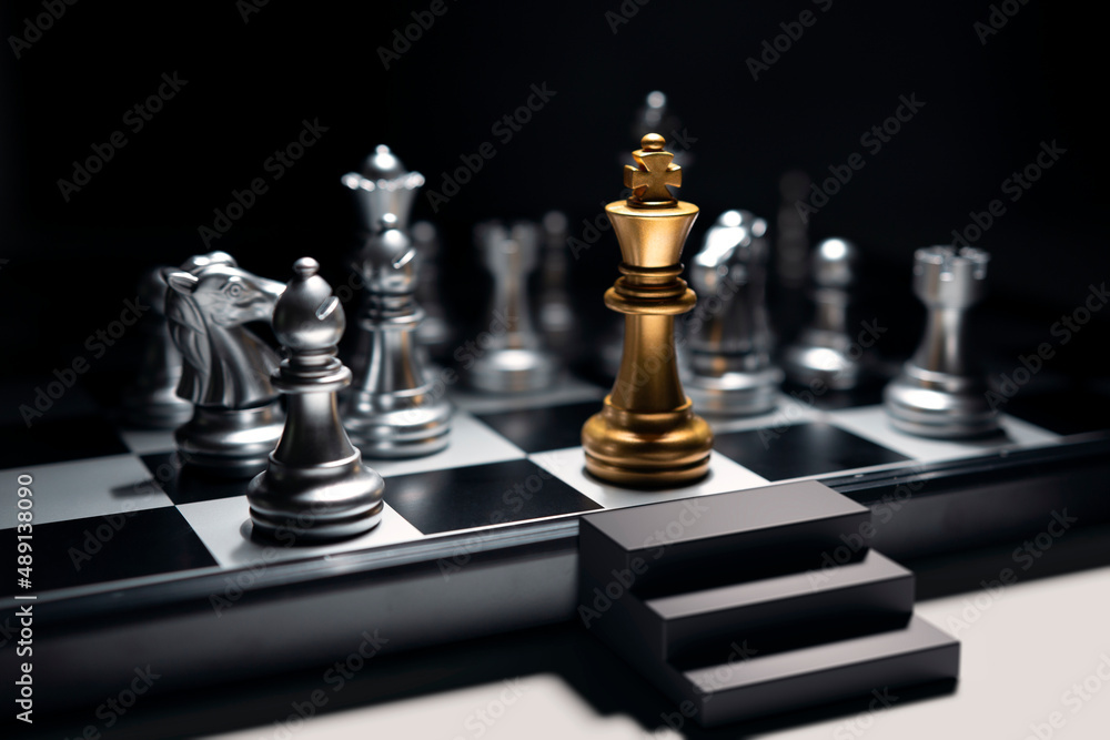 Golden king chess surrounded by enemy Golden king chess surrounded by enemy
