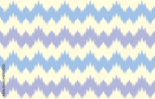 chevron Ikat ethnic strip design background. Seamless blue pastel ikat pattern in tribal, folk embroidery abstract art. art ornament print. Design for carpet, wallpaper, clothing, wrapping.