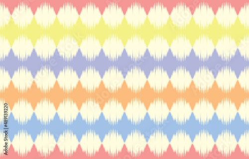 Beautiful ethnic ikat art. Seamless pattern in tribal, folk embroidery, and strip pastel Aztec chevron art ornament print. Design for carpet, wallpaper, clothing, wrapping, fabric, cover.
