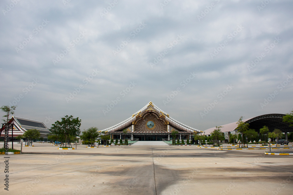 Beautiful art ubosot ordination hall building for thai people travel visit respect praying blessing buddha at Wat Buddha Saeng Tham and Dharma practice office center at Nong Khae in Saraburi, Thailand