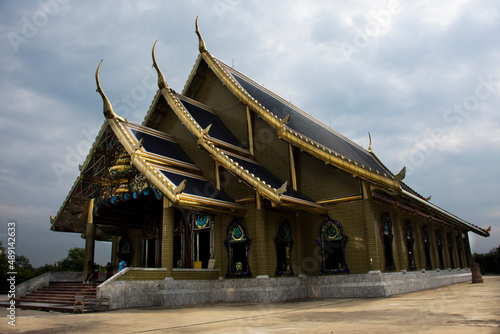 Beautiful art ubosot ordination hall building for thai people travel visit respect praying blessing buddha at Wat Buddha Saeng Tham and Dharma practice office center at Nong Khae in Saraburi, Thailand