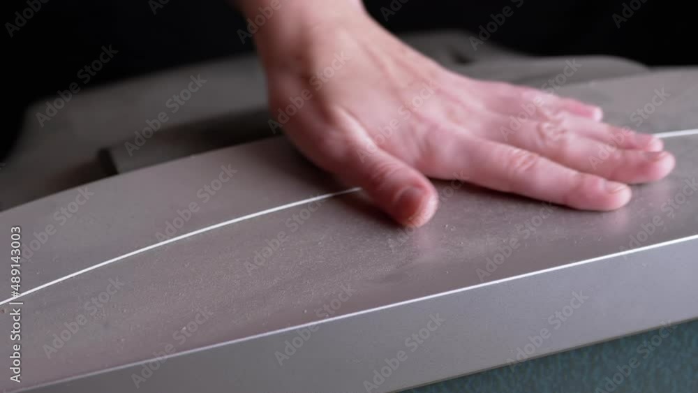 A Female Hand Wipes Dust from an Old Working TV with Fingers. Girl shows the accumulated dust on a broken, vintage turned on TV with static flickering noise interference. Concept of cleaning a home. A Female Hand Wipes Dust from an Old Working TV with Fingers. Girl shows the accumulated dust on a broken, vintage turned on TV with static flickering noise interference. Concept of cleaning a home.