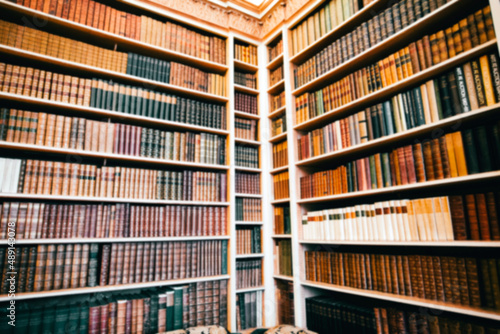 Blurred background of bookshelf full of books