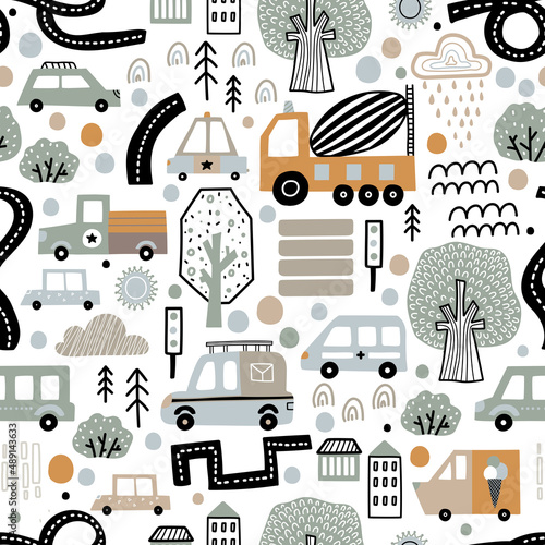 Cute kids seamless pattern with cars on a white background.Can be used in textile industry, paper, background, scrapbooking.Vector © vyazovskaya