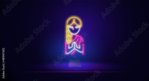 Beautiful Indian girl sitting in neon style. Vector illustration. Esoteric motives of Buddhism. Tattooing, spiritual yoga.