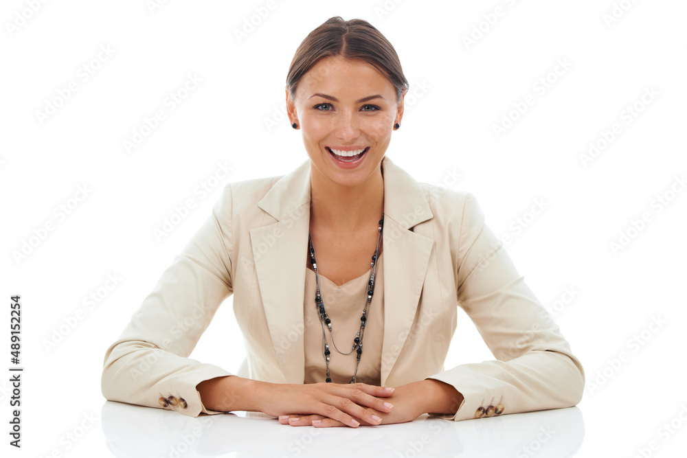 Shes holds a high position in the company. A beautiful young businesswoman seated confidently at her desk isolated on a white background. Shes holds a high position in the company. A beautiful young businesswoman seated confidently at her desk isolated on a white background.