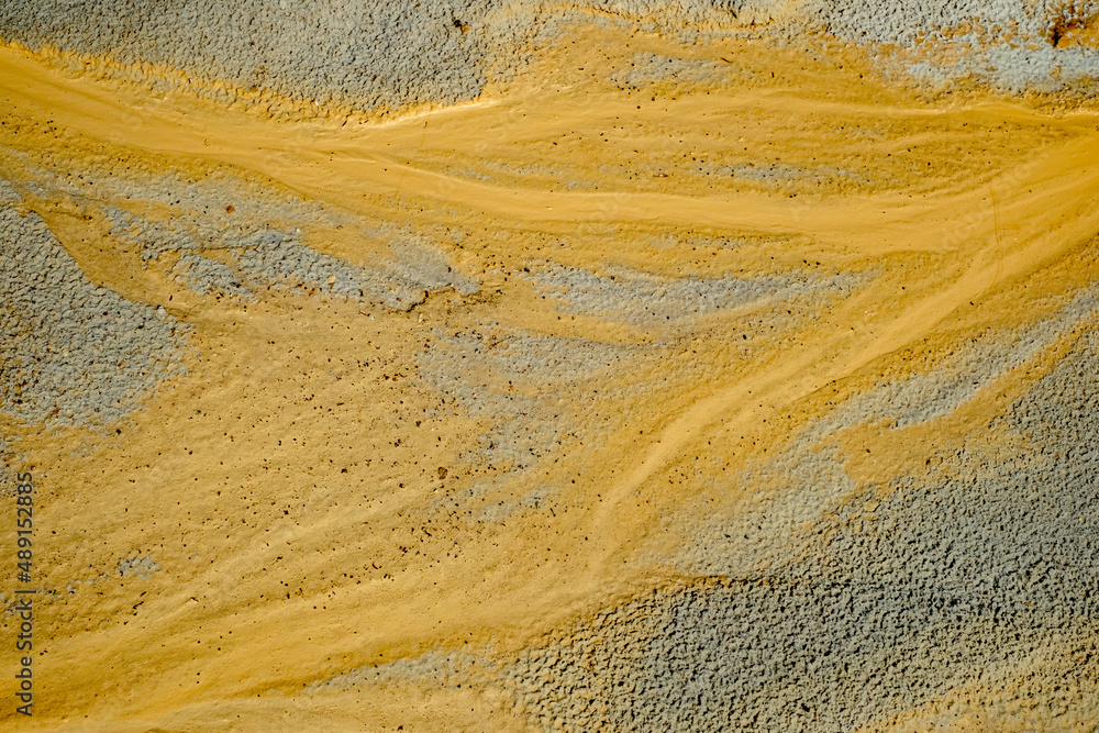 Fototapeta premium Abstract color sand texture at kaolin mine
