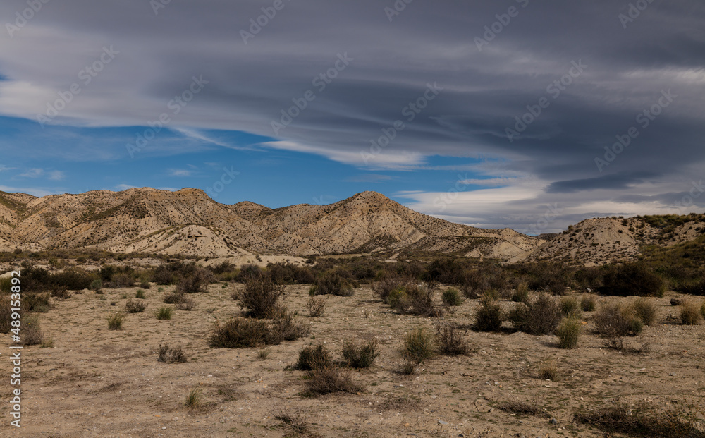 Landscape of Tabernas Desert, Almeria, Spain, against cloudy sky Landscape of Tabernas Desert, Almeria, Spain, against cloudy sky