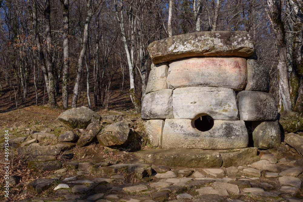 Ancient dolmen in Zhane river gorge on sunny day. Gelendzhik, Krasnodar Krai, Russia