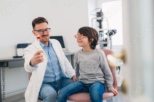 boy having eyesight test on clinic photo