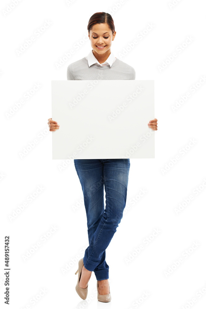 Presenting your message. Studio portrait of an attractive young woman holding a blank placard isolated on white. Presenting your message. Studio portrait of an attractive young woman holding a blank placard isolated on white.